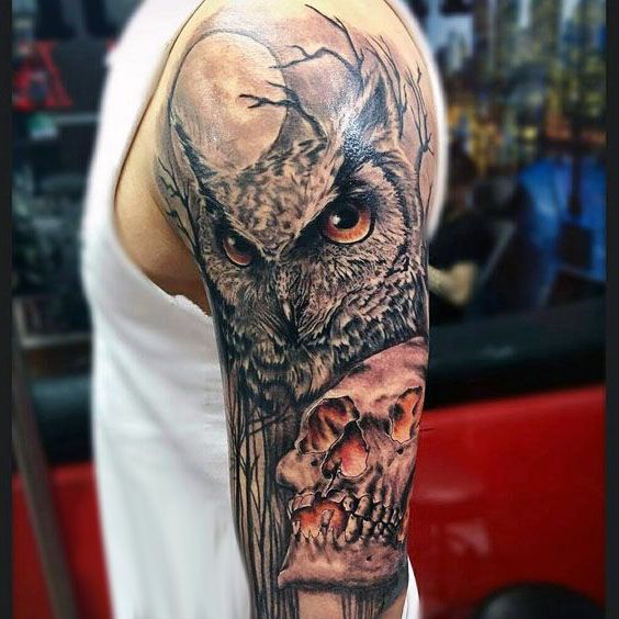 owl and skull arm tattoo