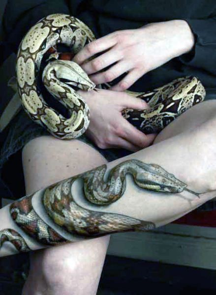 realistic snake tattoo on leg 3d