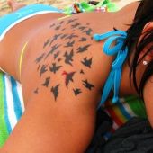 birds back tattoo