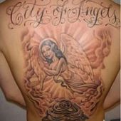 tatuaż religijny anielica