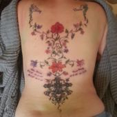 lower back tattoo cross