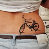 lower back tattoo bike