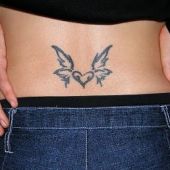 lower back tattoo heart and wings