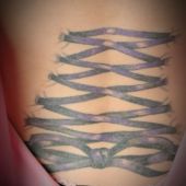 lower back tattoo bow