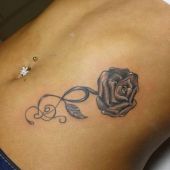 rose stomach tattoo