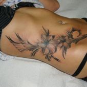 flowers hip tattoo