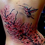 lower back tattoo hummingbird