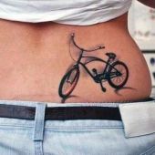 lower back tattoo bike