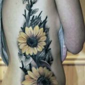 sunflowers side tattoo