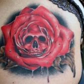 skull and rose tattoo on hip