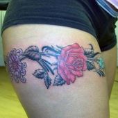 beautiful flowers thigh tattoo