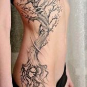tree side tattoo for woman