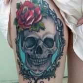 skull and rose thigh tattoo