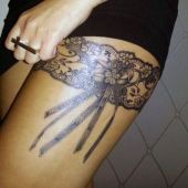 garter thigh tattoo
