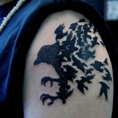 crows arm tattoo