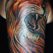 tatuaże zwierzęta lew na ramie
