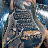 tatuaże muzyczne gitara 3d