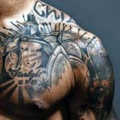 tatuaże męskie na ramie i pierś