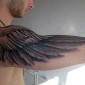 wing arm tattoo
