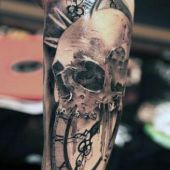 skull tattoo and clock