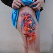 colorful fox tattoo on thigh