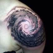 space tattoo on shoulder
