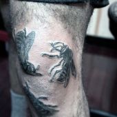 incredible bees leg tattoo