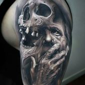 amazing face and skull tattoo