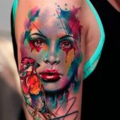 colorful tattoo face and bird