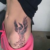 phoenix hip tattoo for woman