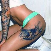 skull hip tattoo