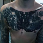 chest tattoo woman and skull