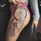 dreamcatcher thigh tattoo for woman