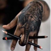 elephant hand tattoo