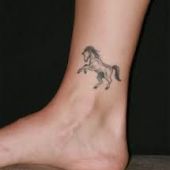horse tattoo ankle