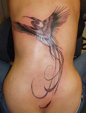 lower back tattoo bird