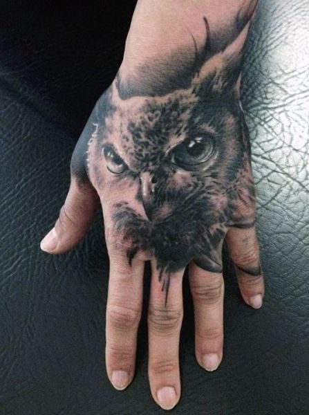 owl hand tatoo