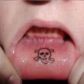 skull lip tattoo