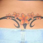 lower back tattoo flower tribal
