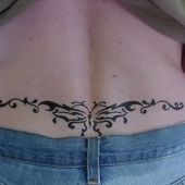 lower back tattoo butterfly tribal
