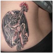 lower back tattoo devil