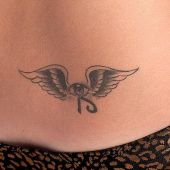 Lower Back Tattoos Eye Wings