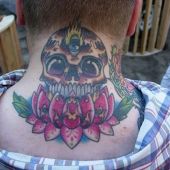 lotus skull neck tattoo