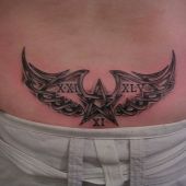 lower back tattoo celtic wings star