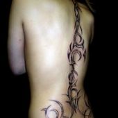 tribal girl back tattoo