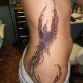 phoenix na boku tatuaże
