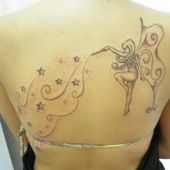 cute fairy back tattoo