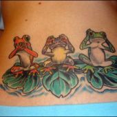 lower back tattoo frogs