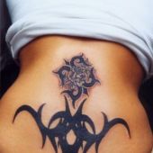 lower back tattoo tribal rose