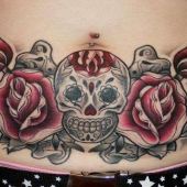 stomach tattoo skull rose